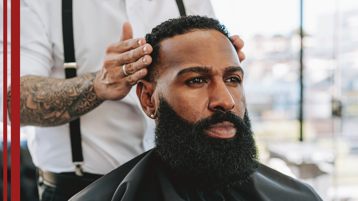A client gets his hair cut at a new shop, a space he found online after the shop tried cost effective marketing strategies for small businesses.